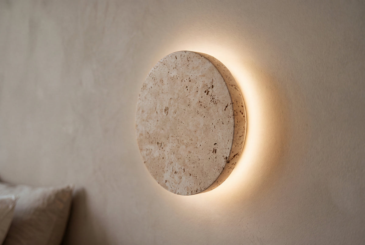 The Alba Travertine Wall Light, lifestyle close-up
