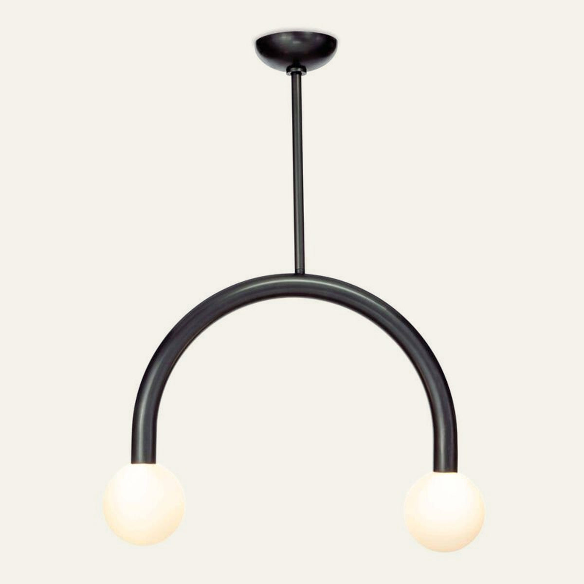 The Bilancia alabaster pendant light, two stone spheres at the ends of a black metal arch