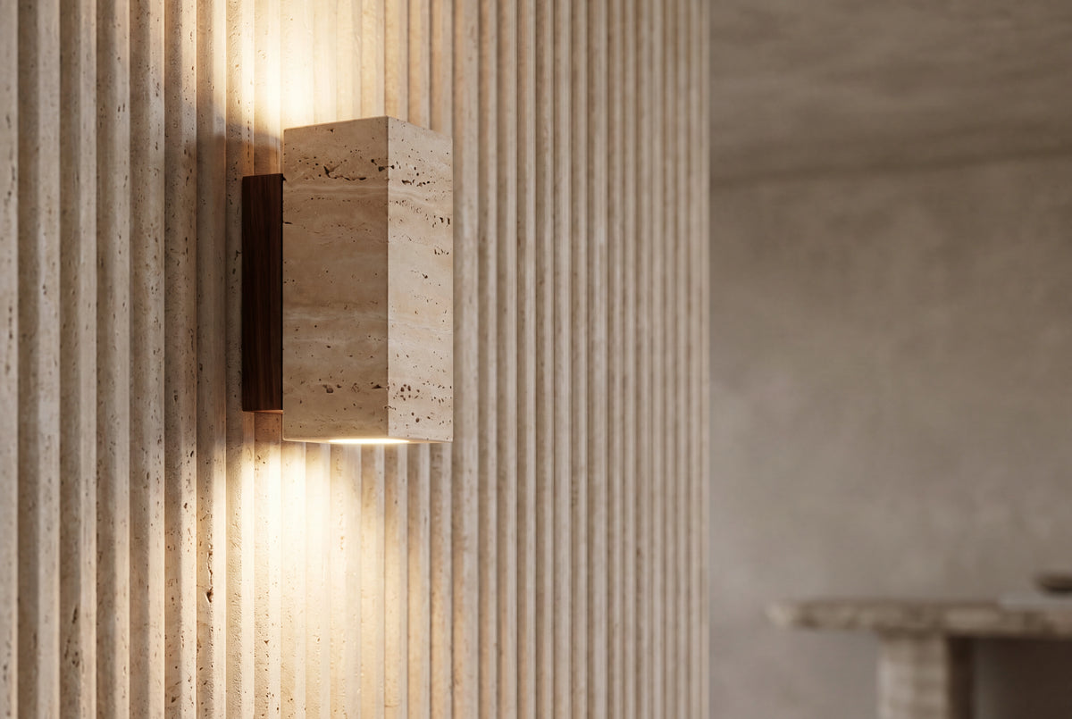 The Blocco Travertine Wall Light, lifestyle close-up