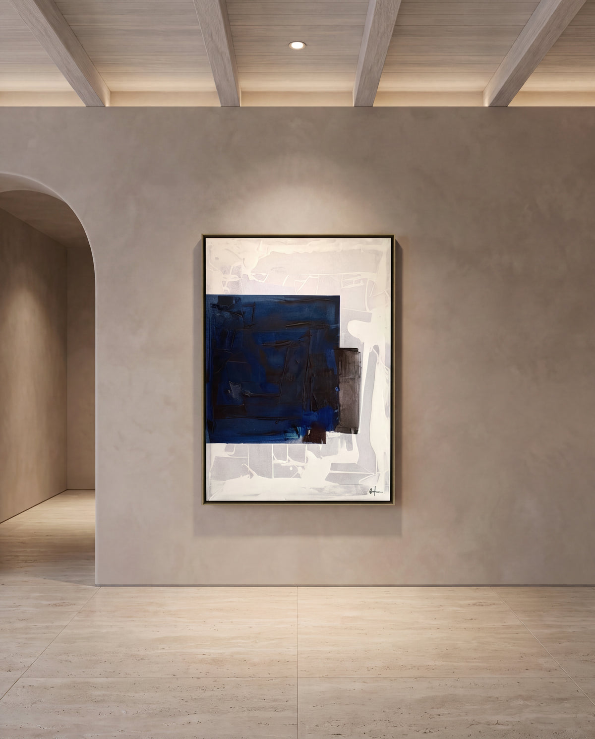 Capomuro 2 canvas artwork in a gold frame on a plaster wall