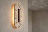 The Capsula Travertine Wall Light