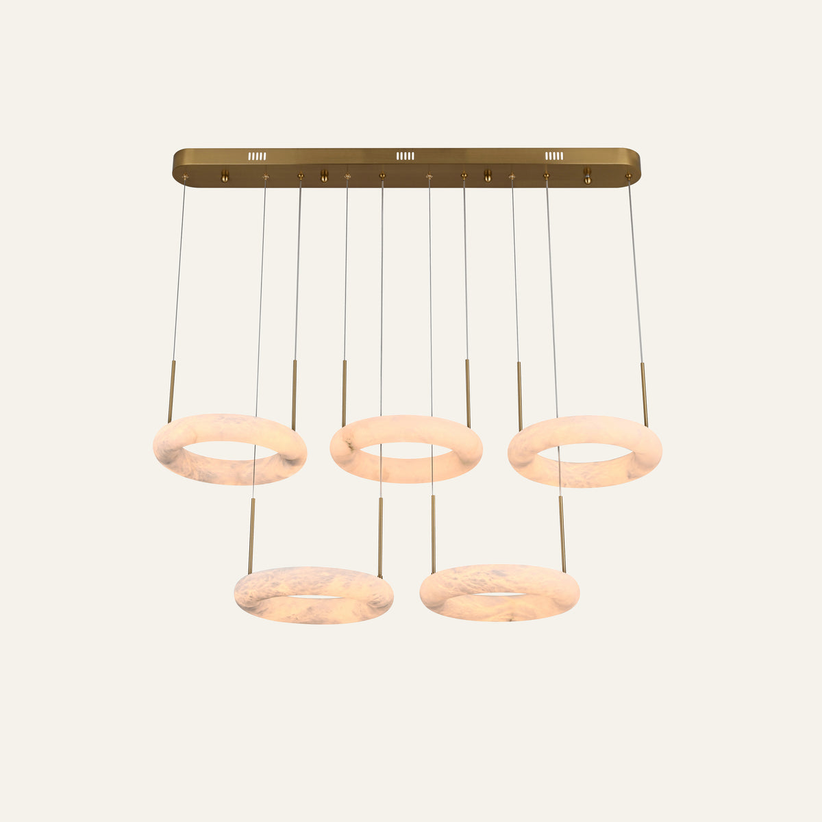 The Cascata alabaster chandelier, five rings in brass
