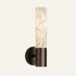 The Cera alabaster wall light in bronze