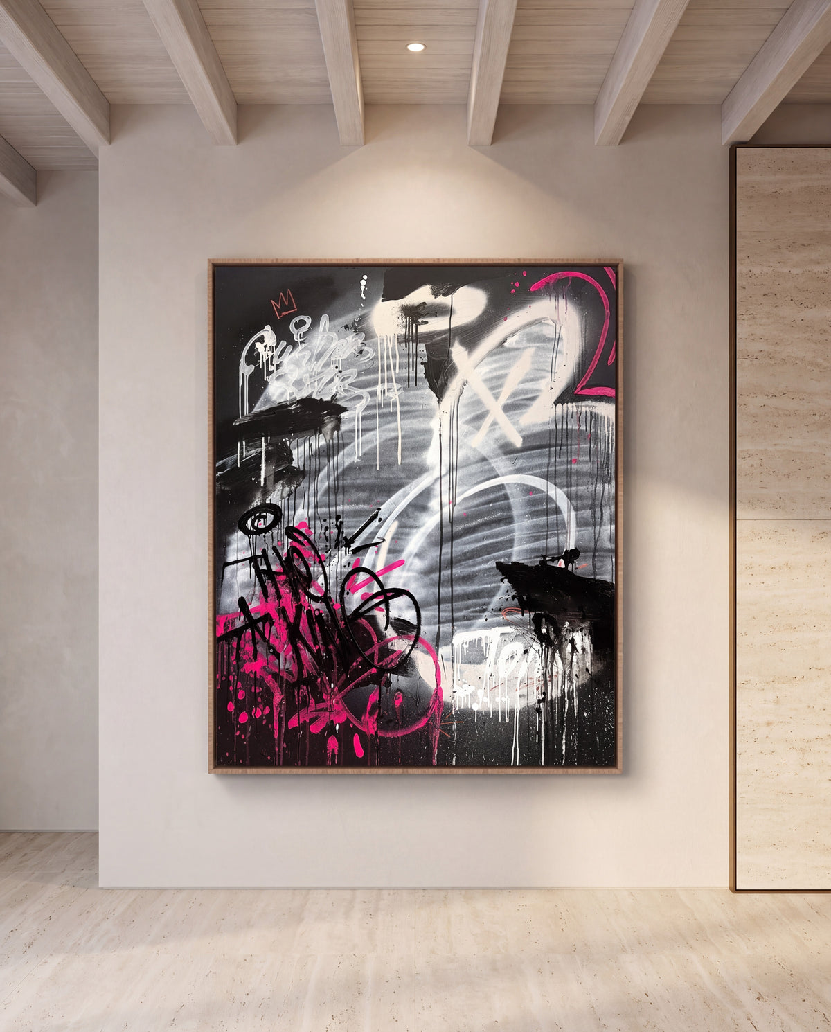 Coeur Brut canvas artwork in an oak frame on a plaster wall