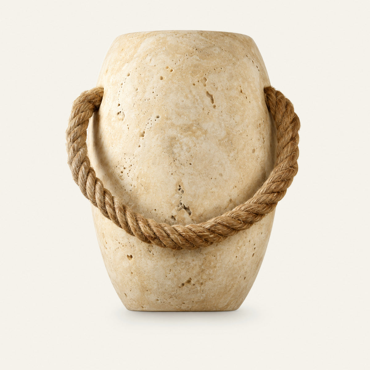 The Corda travertine wall light, a stone vessel wrapped in natural rope