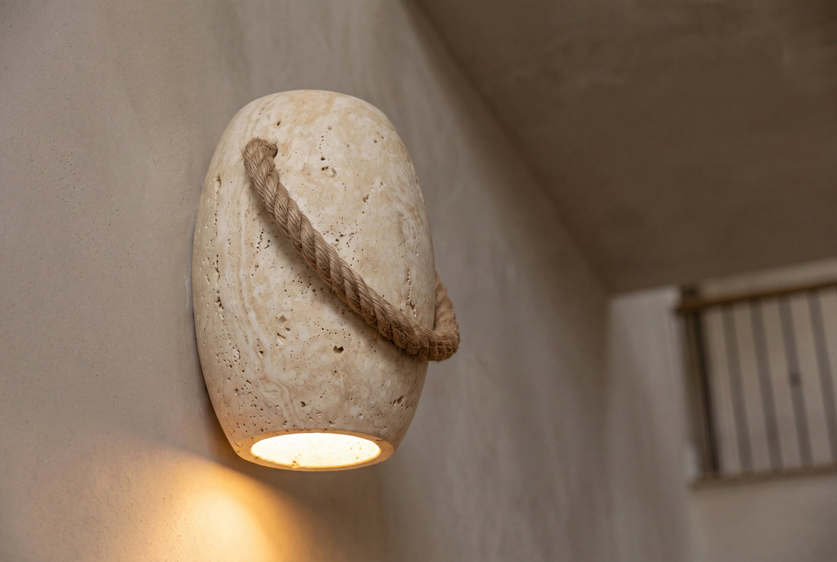 The Corda Travertine Wall Light, lifestyle close-up