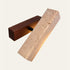 The Croce travertine wall light with a walnut bar