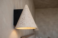 The Cuspide Travertine Wall Light