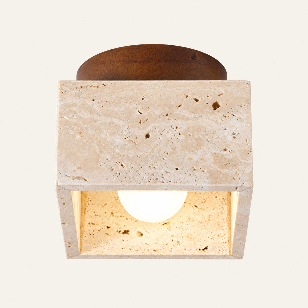 The Dado travertine flush ceiling light, a square stone downlight