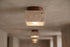 The Dado Travertine Flush Ceiling Light, lifestyle close-up
