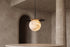 The Eclisse Alabaster Pendant Light, lifestyle close-up