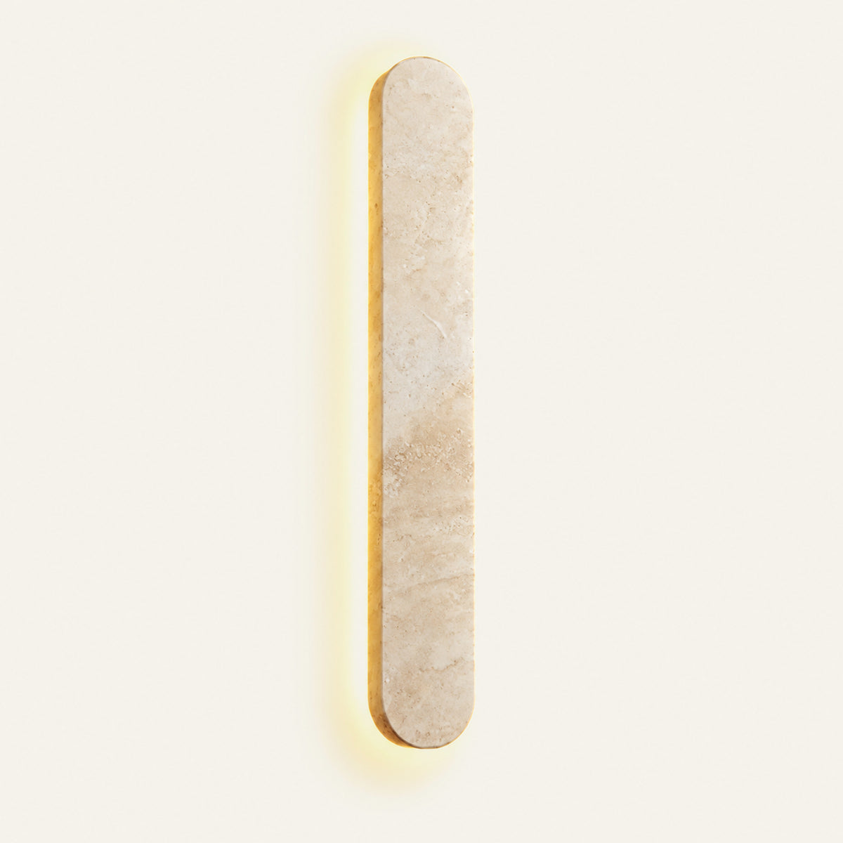 The Ellisse travertine wall light, L60cm