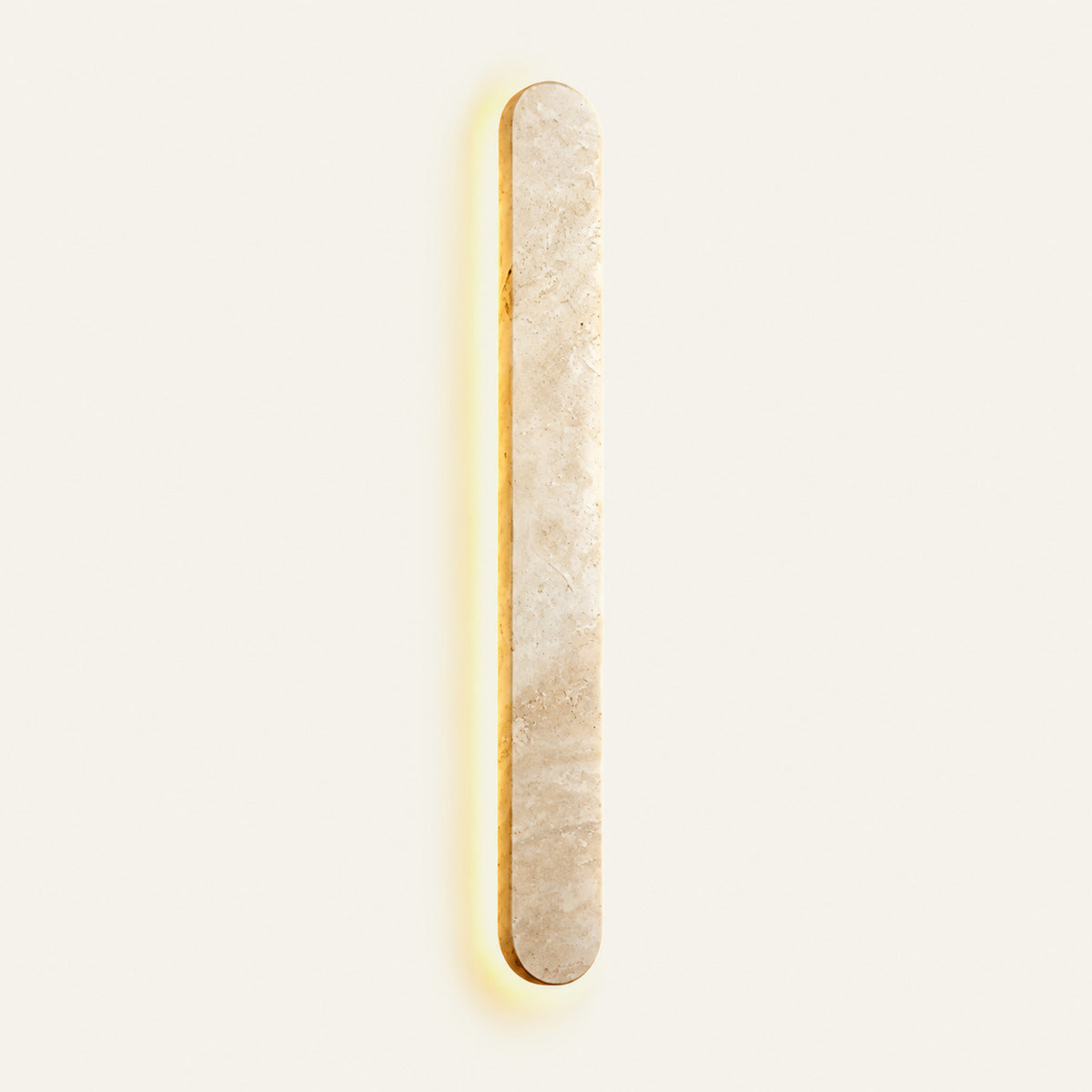 The Ellisse travertine wall light, L80cm