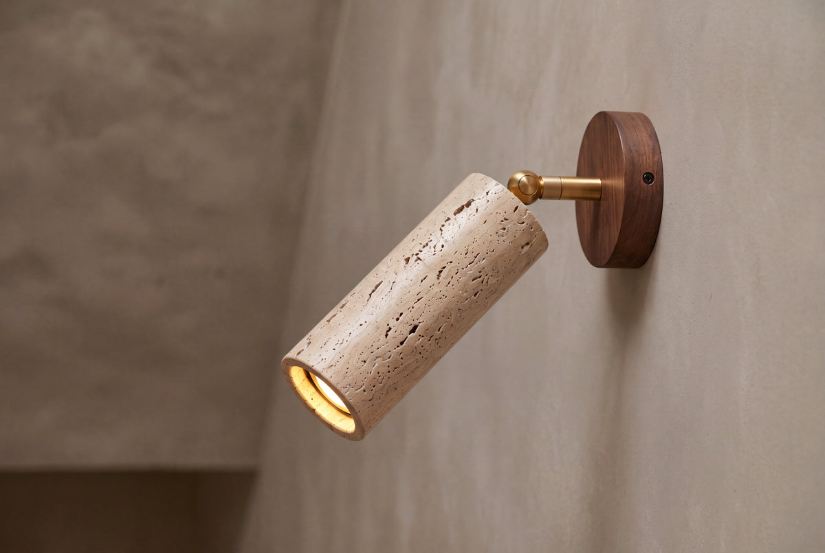 The Faretto Travertine Wall Light, lifestyle close-up