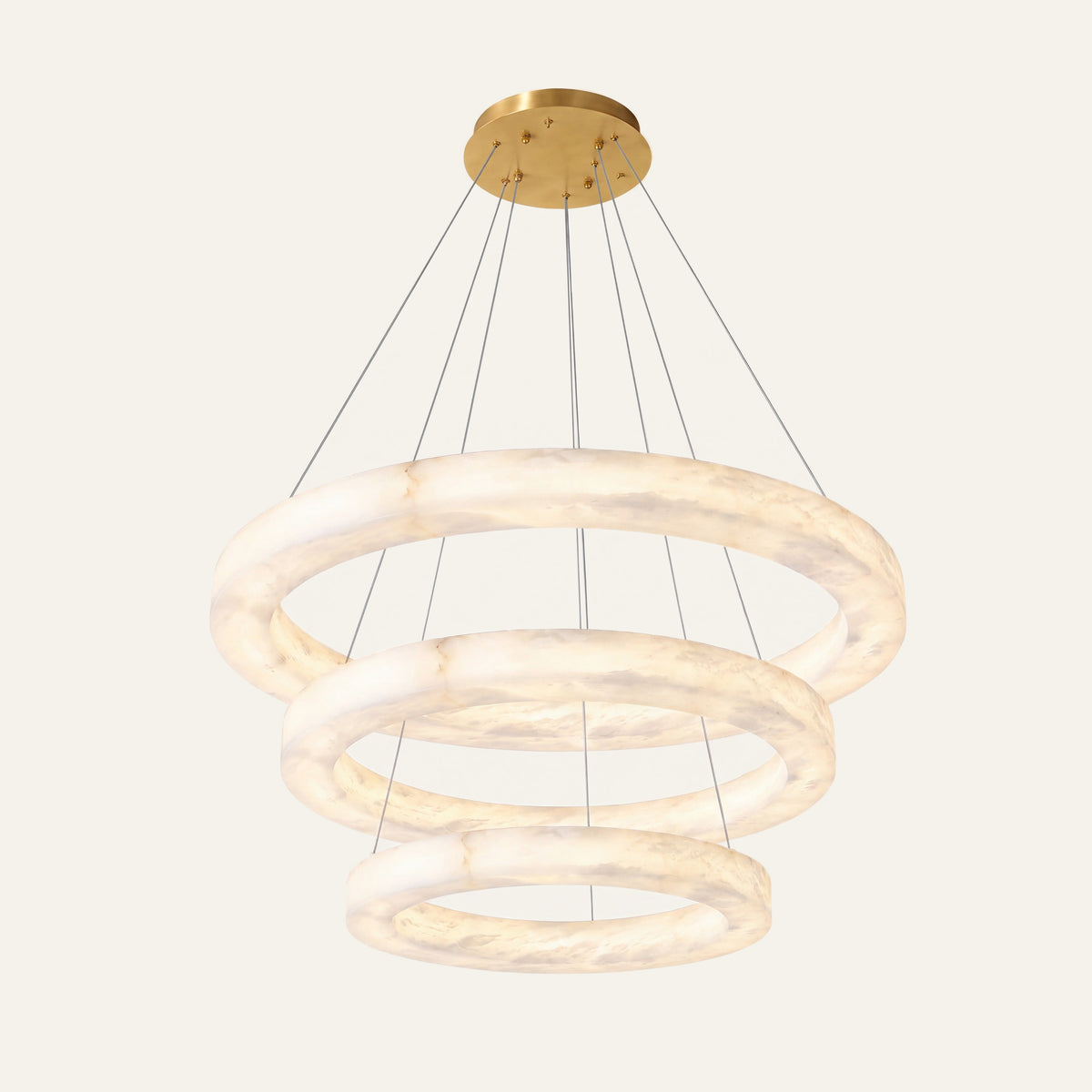 The Fascia alabaster chandelier, three tiers stacked, in brass