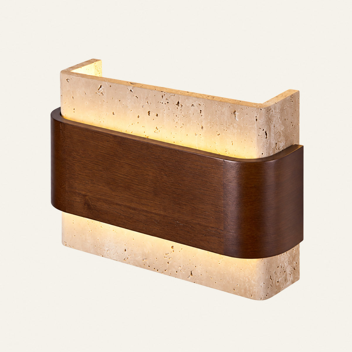 The Fascio travertine wall light with a walnut band, angled view