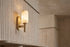 The Fiaccola Alabaster Wall Light, lifestyle close-up