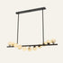 The Filo alabaster chandelier with 11 stone spheres along a black metal bar