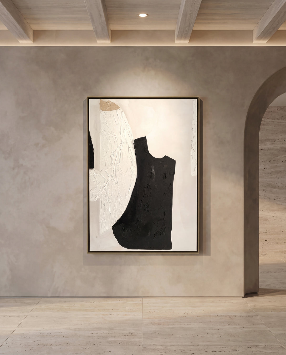 Forma canvas artwork in a gold frame on a plaster wall
