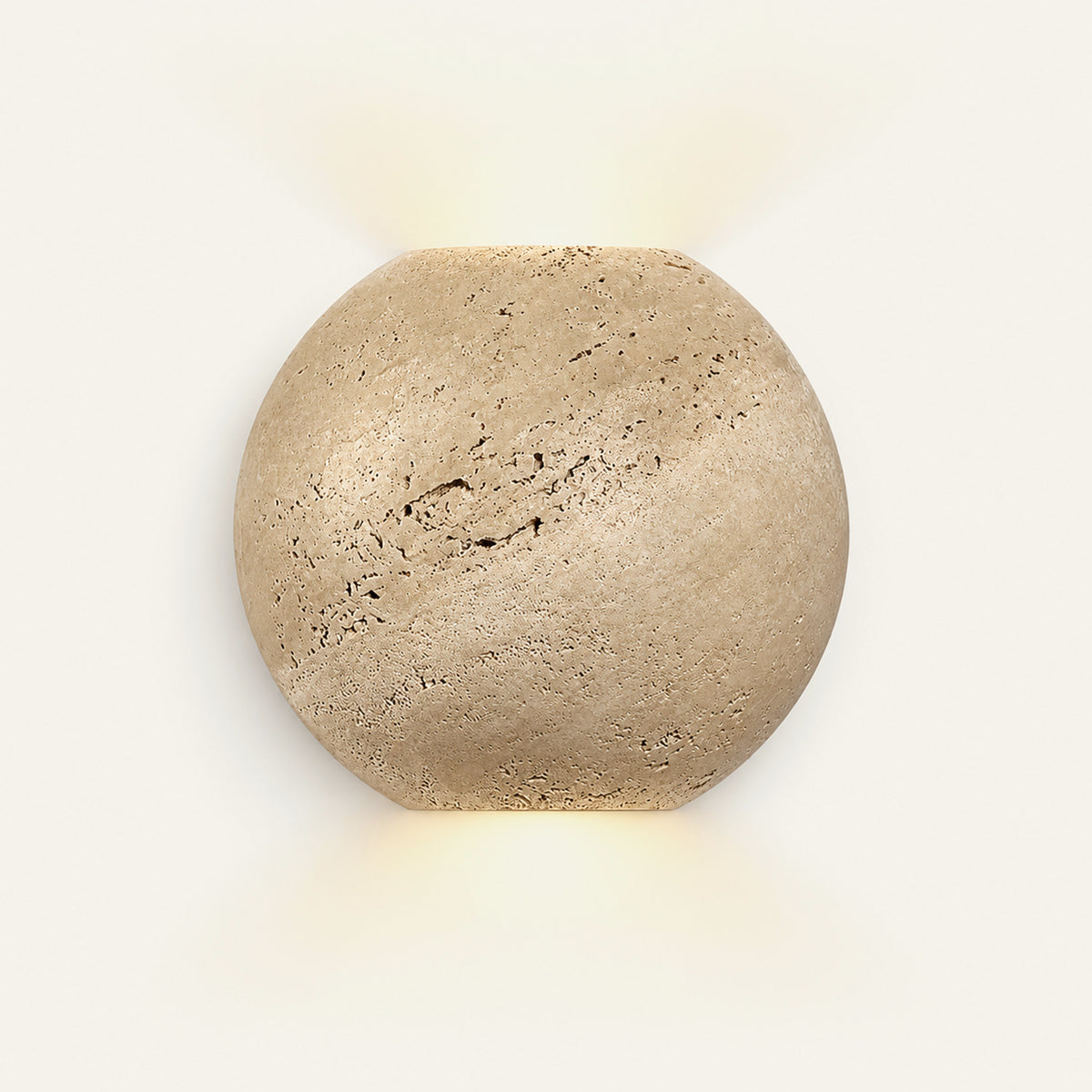 The Globo travertine wall light, a stone globe washing light up and down