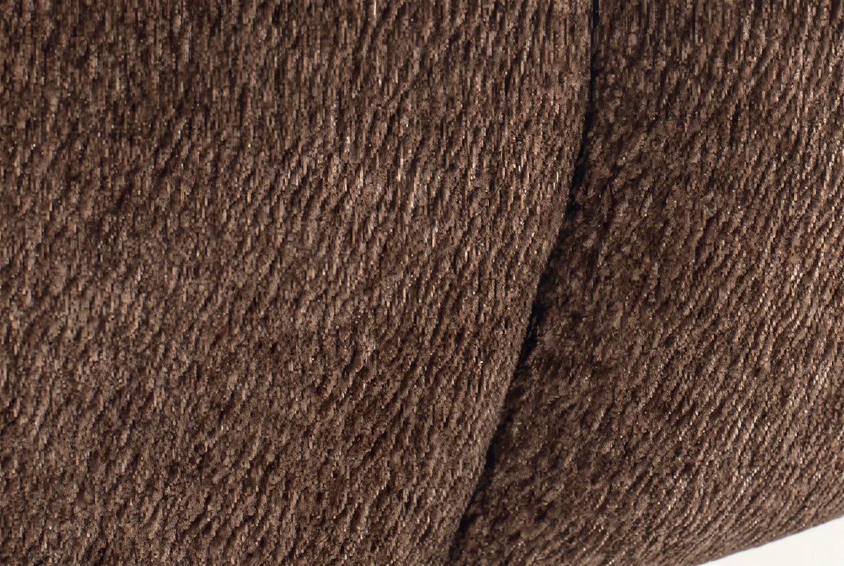 The Ancona Swivel Chair, close-up of the chocolate brown upholstery and swivel base
