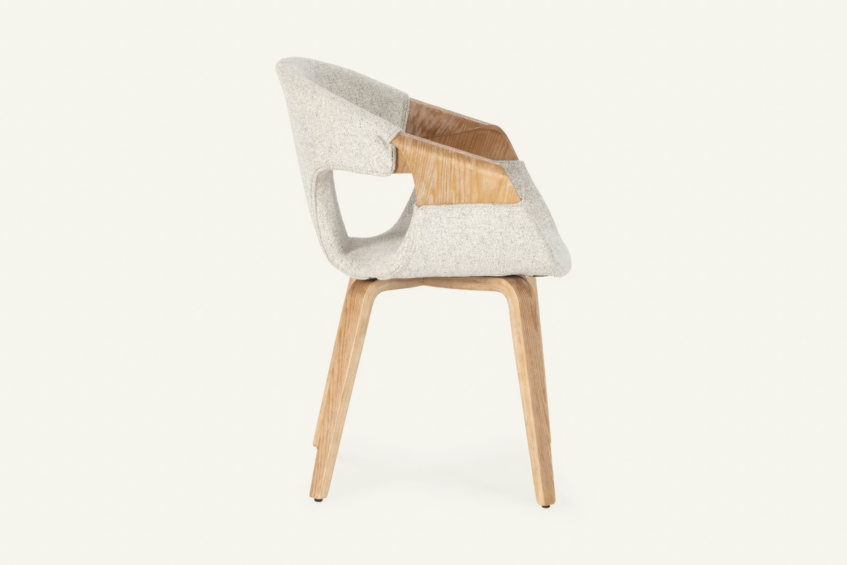 The Ascoli Dining Chair, ivory dining chair with an open curved oak back, studio view
