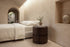 The Bellano Bedside Table in walnut beside the Positano bed in a barrel-vaulted plaster bedroom