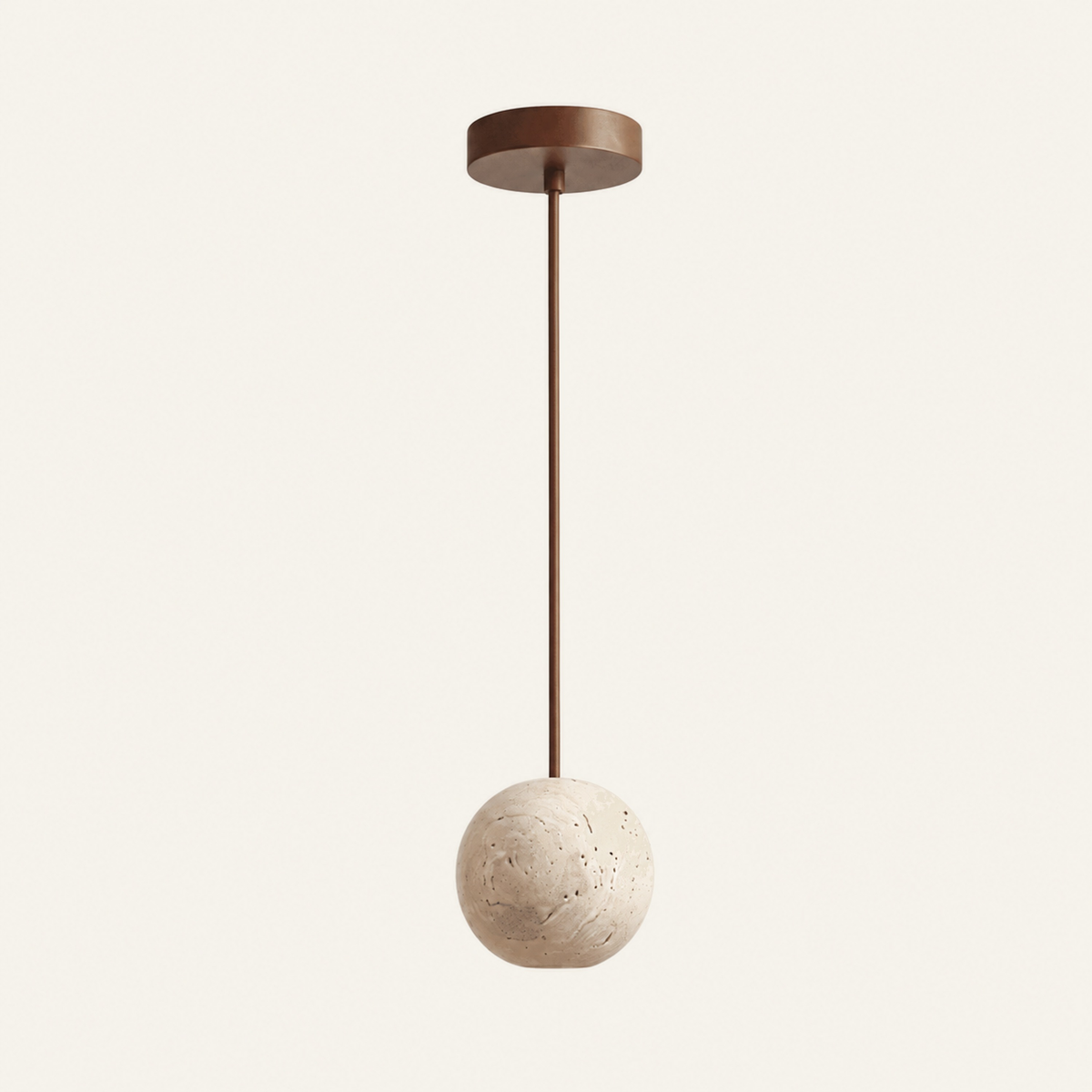 The Biglia travertine pendant light, a small solid stone sphere on a fine cable with a wood ceiling plate