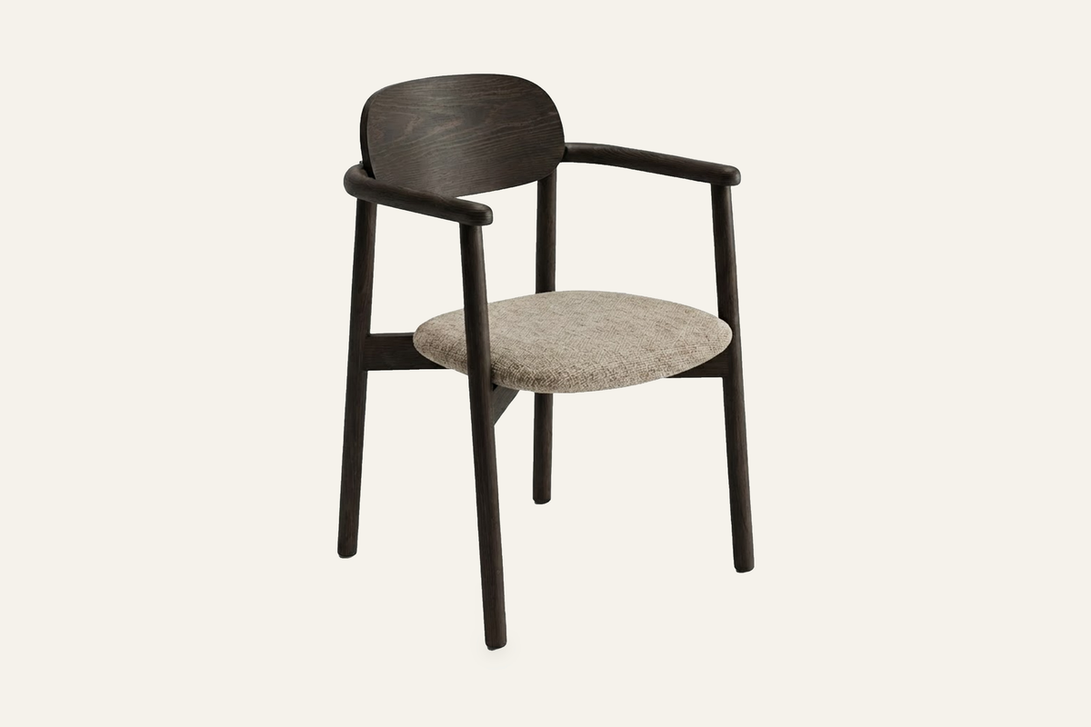 The Brescia Dining Armchair in beige and dark walnut, solid ash dining armchair with a curved back, studio view