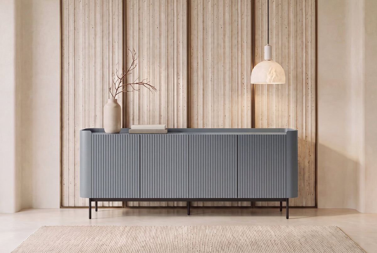 The Camogli Fluted Sideboard in blue, fluted sideboard with rounded ends, styled in a room