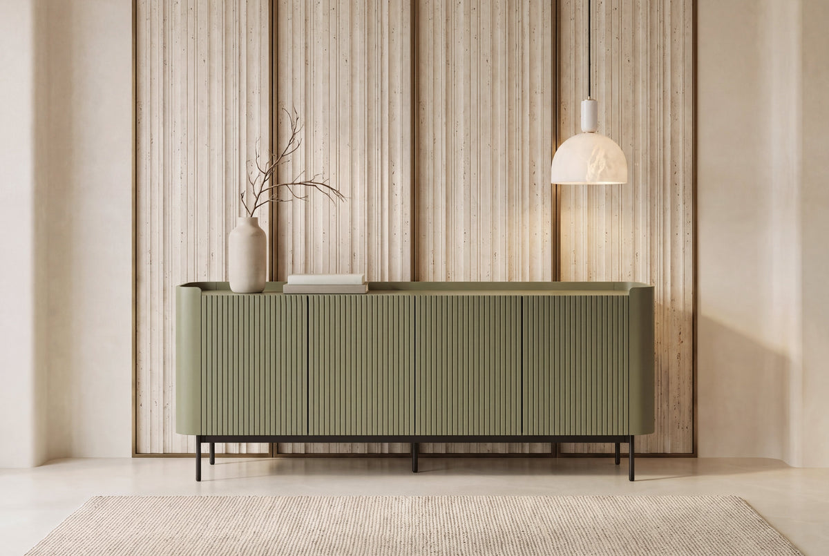 The Camogli Fluted Sideboard in sage, fluted sideboard with rounded ends, styled in a room