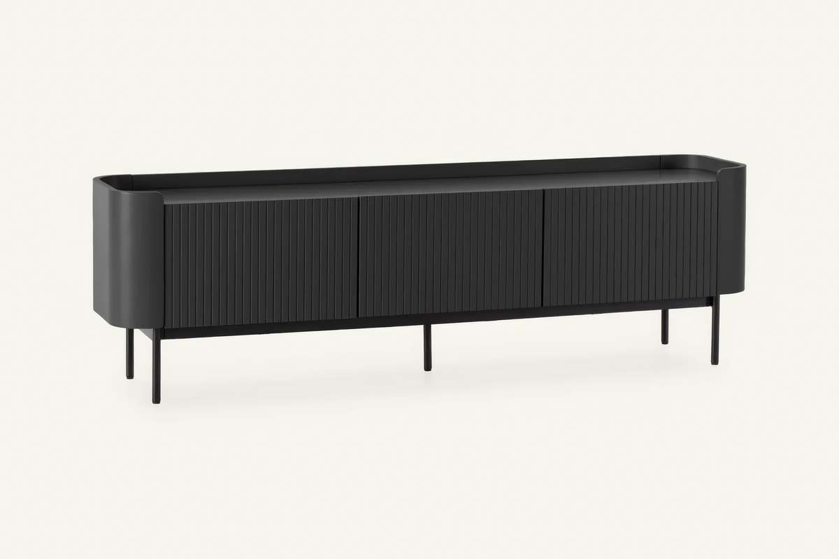 The Camogli Fluted TV Unit in black, fluted TV unit with rounded ends, studio view