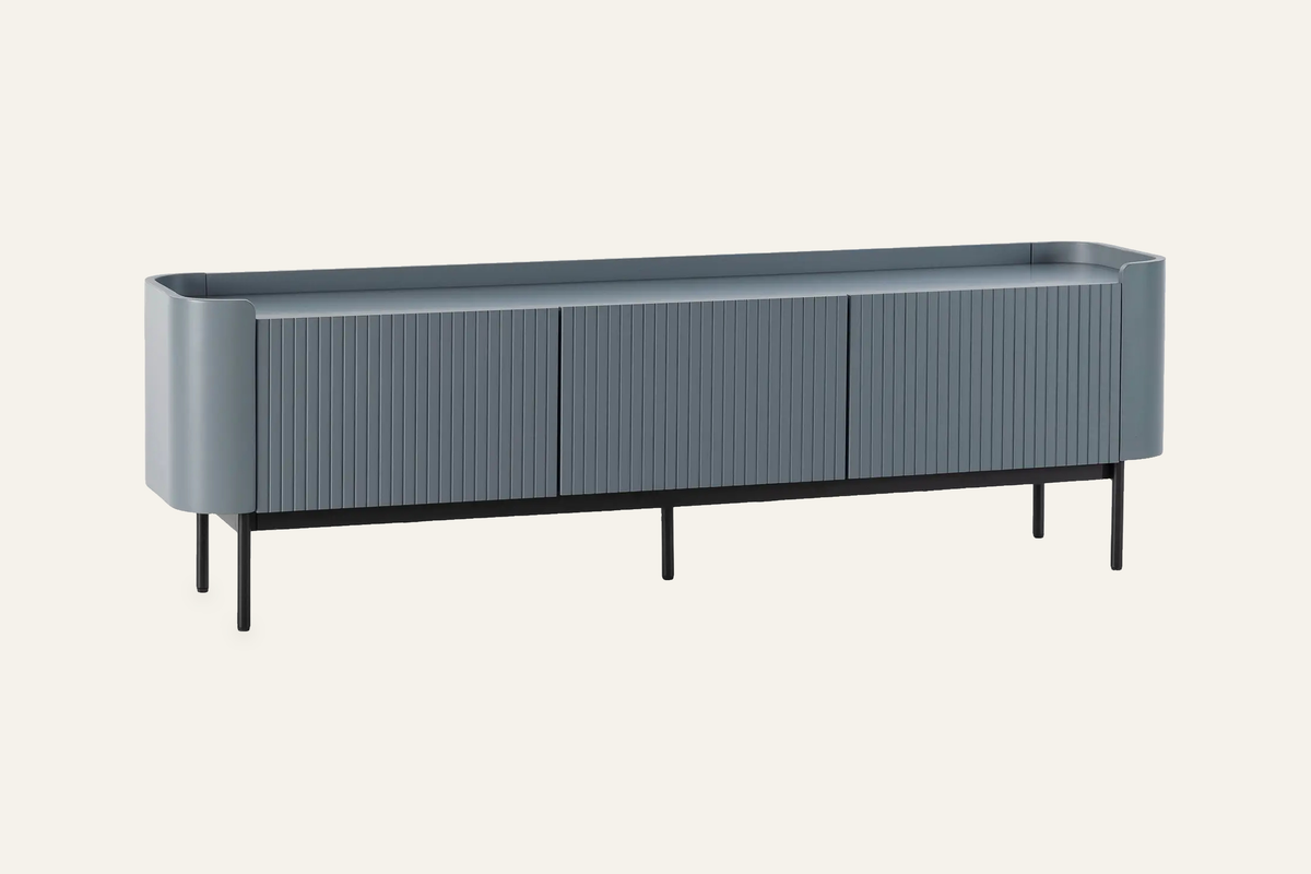 The Camogli Fluted TV Unit in blue, fluted TV unit with rounded ends, studio view