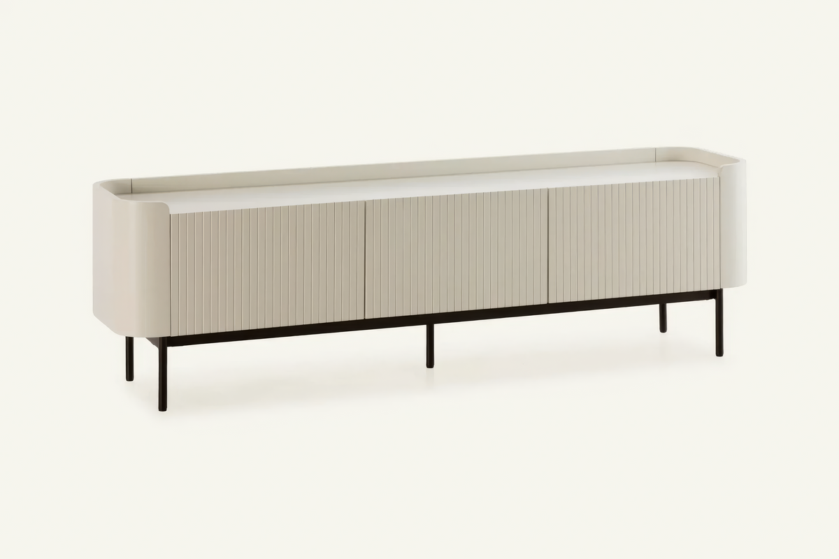 The Camogli Fluted TV Unit in cream, fluted TV unit with rounded ends, studio view