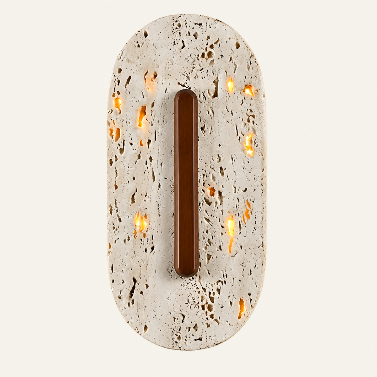 The Capsula travertine wall light, a tall rounded stone capsule with a vertical wooden bar and a soft halo of light
