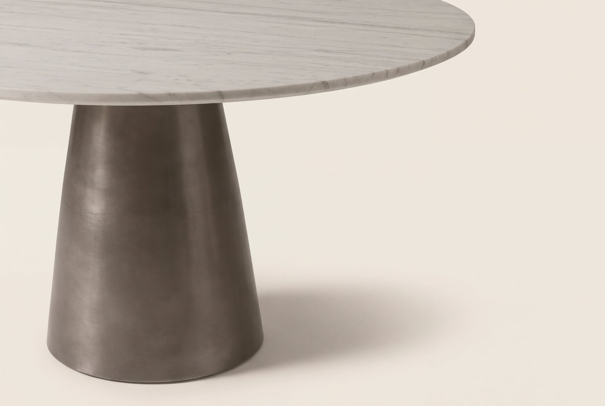 The Carrara Marble Round Dining Table, close-up of the finish
