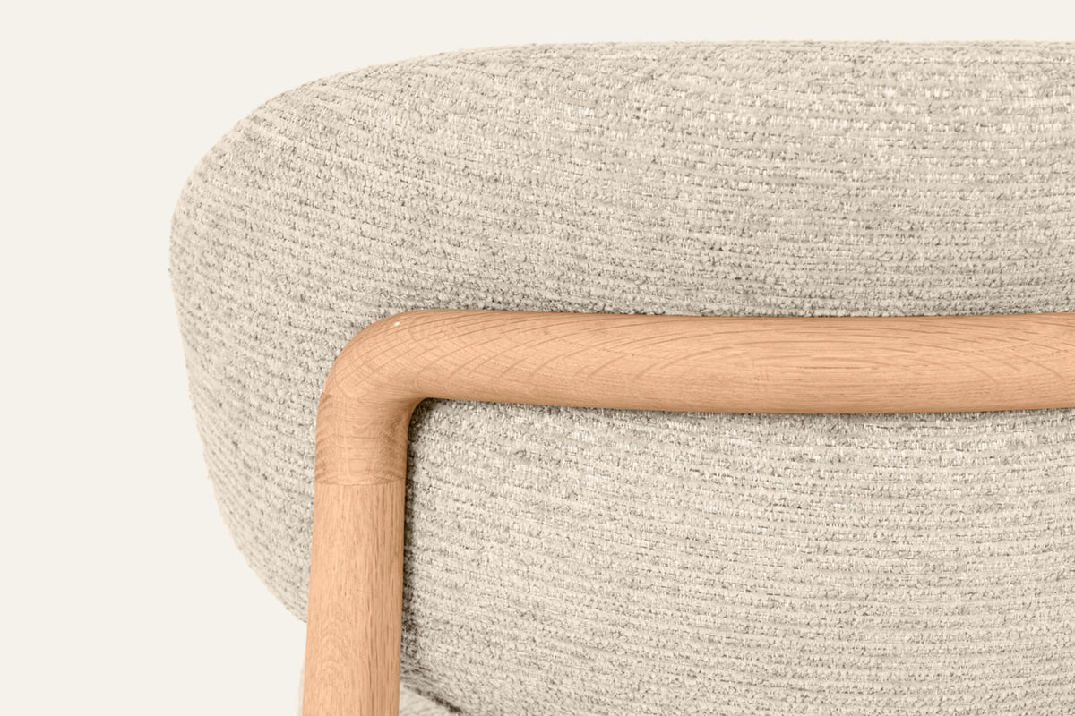 The Cervo Counter Stool, close-up of the textured beige fabric