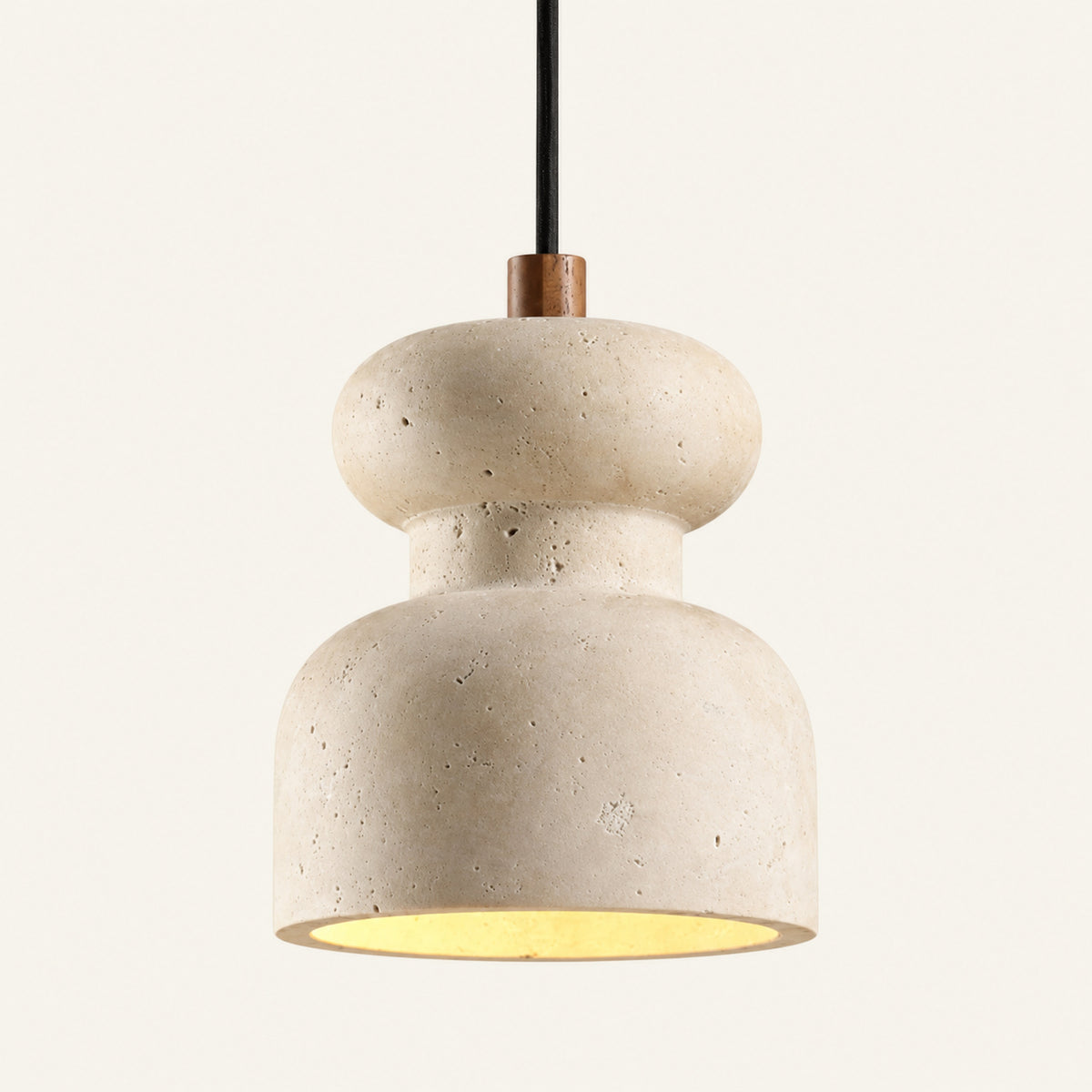 The Clessidra travertine pendant light, a cream stone hourglass shape hanging from a fine dark cable
