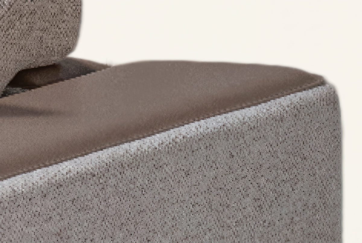 The Cremona Sofa, close-up of the leather arm cap and flecked weave