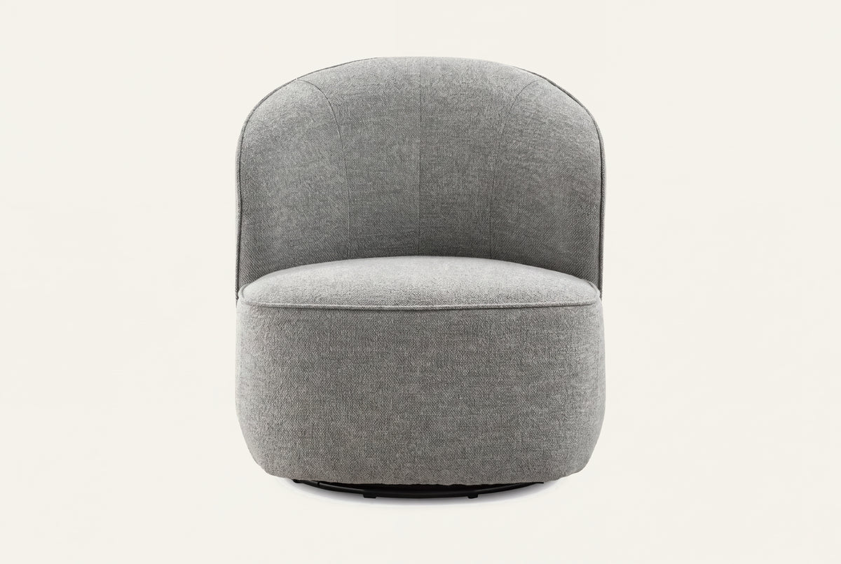 The Erice Accent Chair, tall rounded grey accent chair, studio view