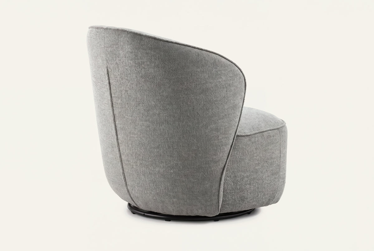 The Erice Accent Chair, tall rounded grey accent chair, studio view