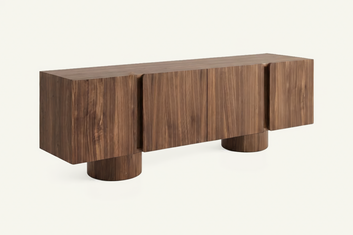 The Faenza TV Unit in walnut, walnut TV unit on round pillar feet, studio view