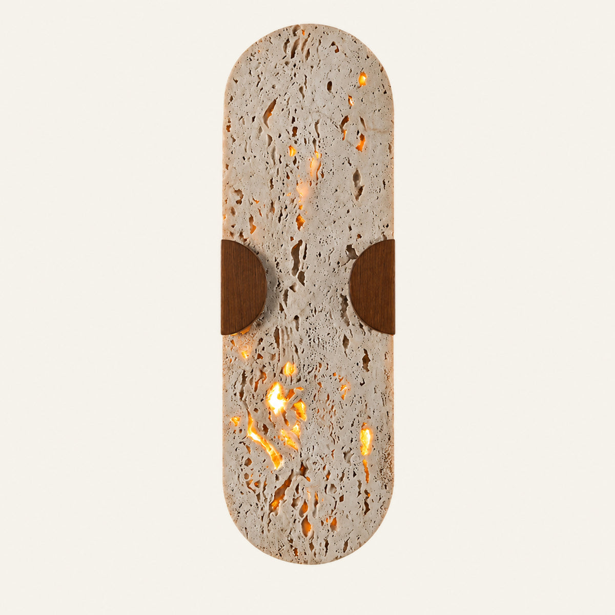 The Fermaglio travertine wall light, a slim stone capsule held by two half round wooden clips
