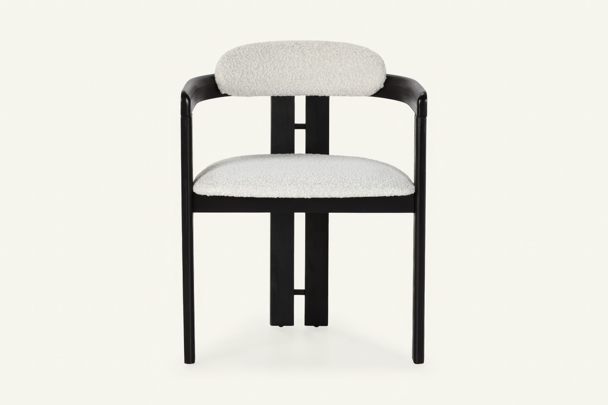 The Garda Dining Armchair, dining armchair with an ivory boucle seat on a black frame, studio view