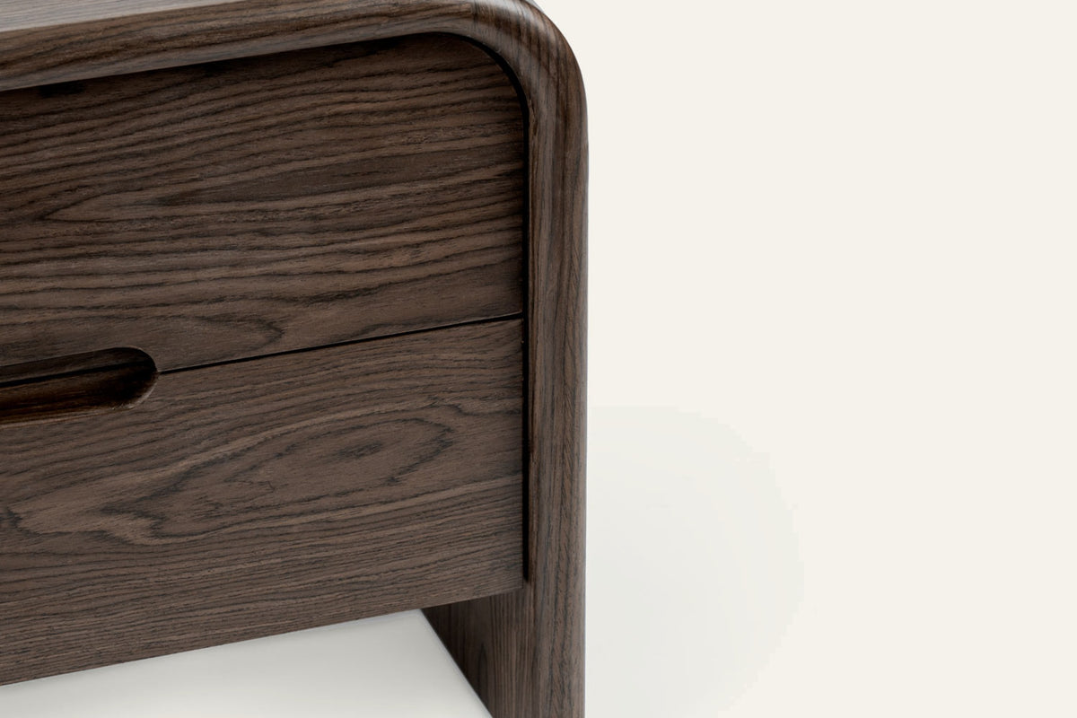 The Limone Bedside Table, close-up of the walnut grain and drawer pull