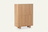 The Menton Highboard in oak, highboard with rounded sides, studio view
