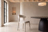 The Nardò Dining Chair in beige, room setting, Kunal Trehan