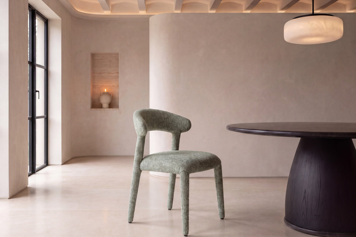 The Nardò Dining Chair in green, room setting, Kunal Trehan