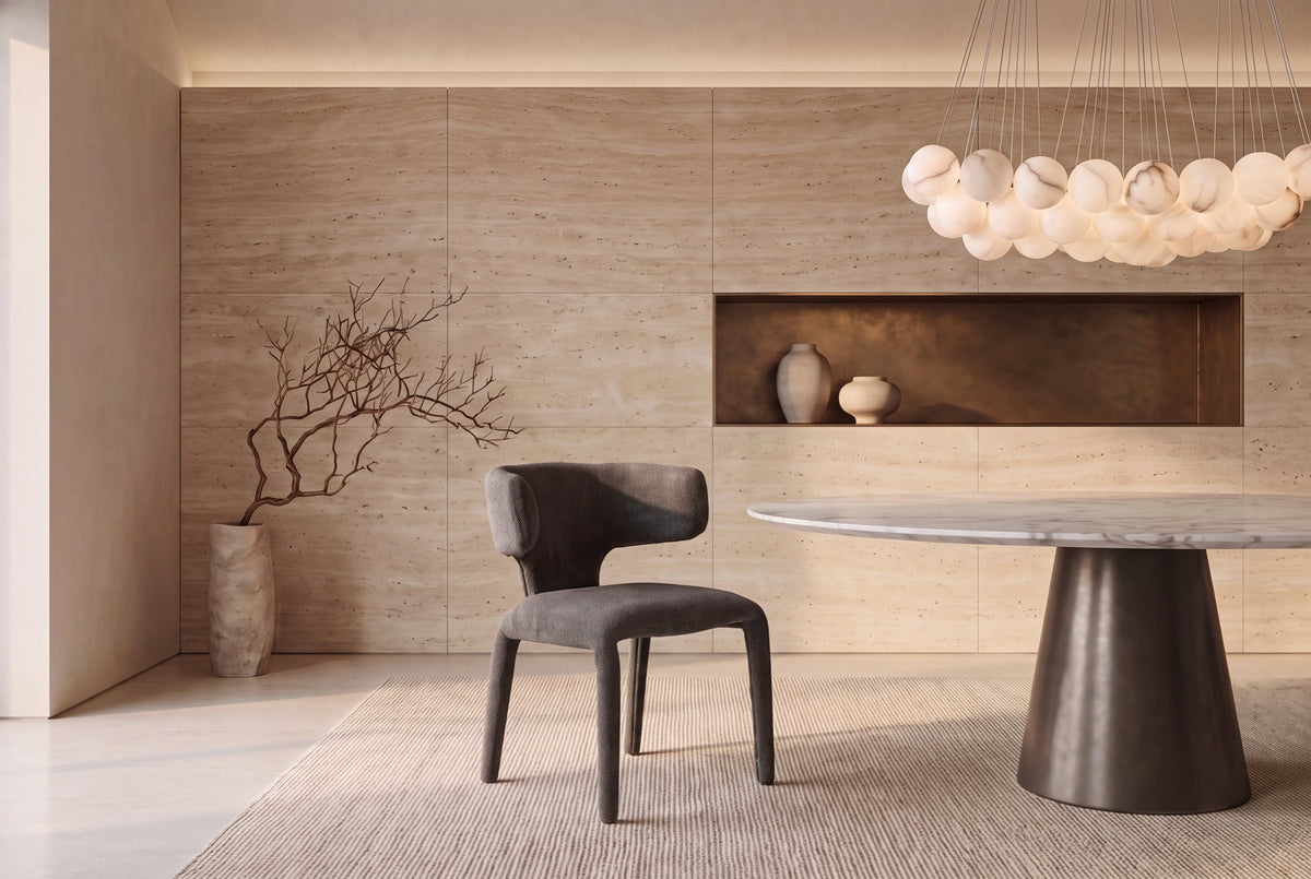 The Nemi Dining Chair in charcoal, fully upholstered curved dining chair, styled in a room
