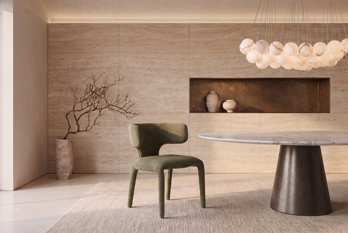 The Nemi Dining Chair in olive, fully upholstered curved dining chair, styled in a room